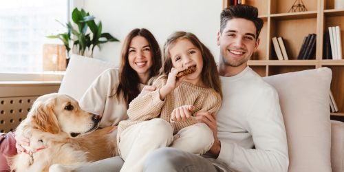 Beautiful,Smiling,Family,,Happy,Mother,,Father,And,Cute,Daughter,Eating